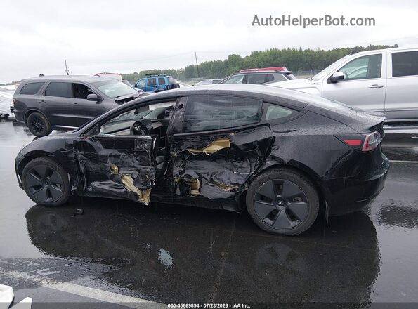 5YJ3E1EB4MF928349 2021 TESLA MODEL 3 Black Rear interior view