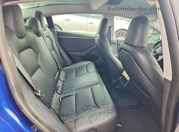 5YJ3E1EB4RF755066 2024 TESLA MODEL Blue Vista de los asientos traseros