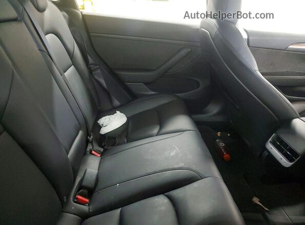 5YJ3E1EB5PF663056 2023 TESLA MODEL Gray Rear seats view