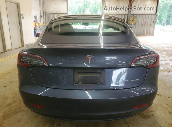 5YJ3E1EB5PF663056 2023 TESLA MODEL Gray Rear view