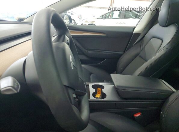 5YJ3E1EB5PF663056 2023 TESLA MODEL Gray Front interior view