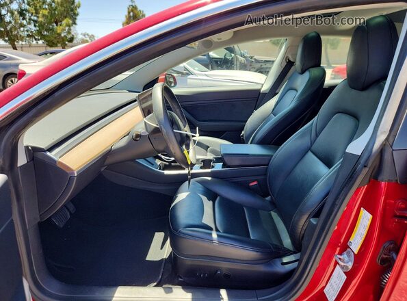 5YJ3E1EB6LF635809 2020 TESLA MODEL Red Front interior view
