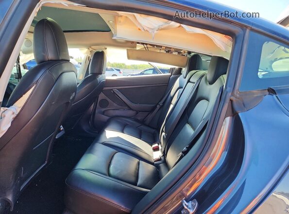 5YJ3E1EB6NF129352 2022 TESLA MODEL Gray Вид задньої частини салону
