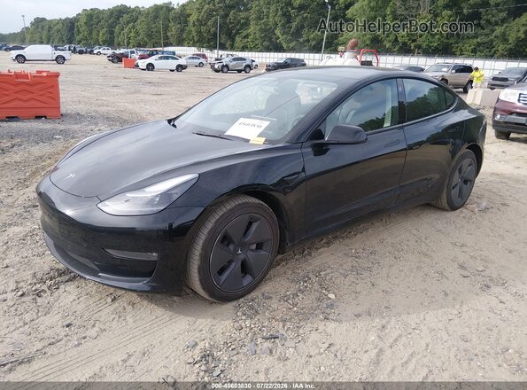 5YJ3E1EB6NF311486 2022 TESLA MODEL 3 Черный Передняя левая четверть