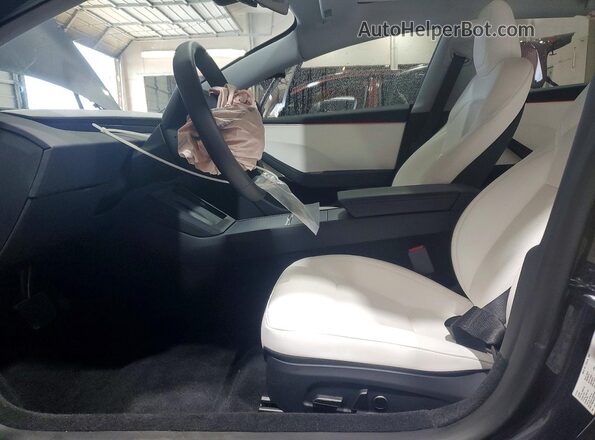 5YJ3E1EB6SF053420 2025 TESLA MODEL Gray Widok wnętrza z przodu