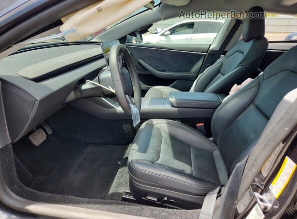 5YJ3E1EB6SF054356 2025 TESLA MODEL Gray Vista interior delantera