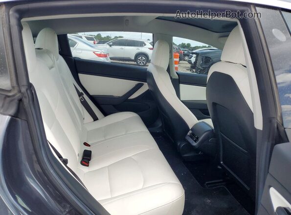 5YJ3E1EB7JF055143 2018 TESLA MODEL Gray Rear seats view