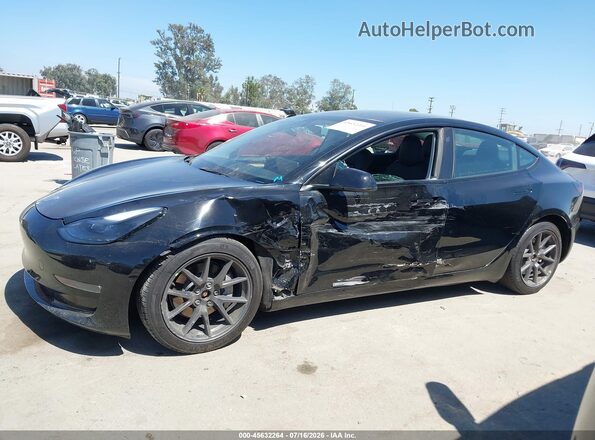 5YJ3E1EB7NF180648 2022 TESLA MODEL 3 Black Widok wnętrza z tyłu