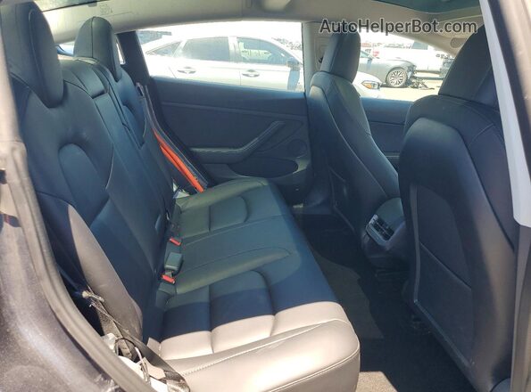 5YJ3E1EB7PF386359 2023 TESLA MODEL Gray Widok tylnych siedzeń