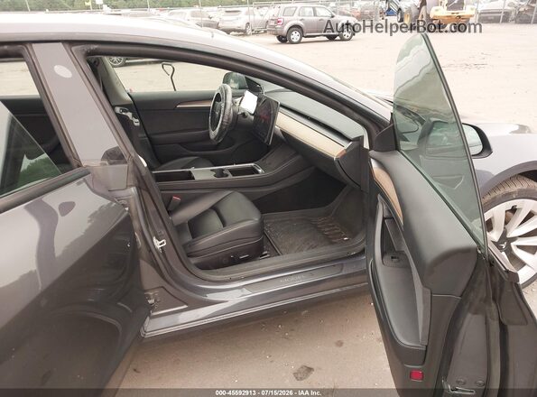 5YJ3E1EB7PF415861 2023 TESLA MODEL 3 Black Вид салону спереду