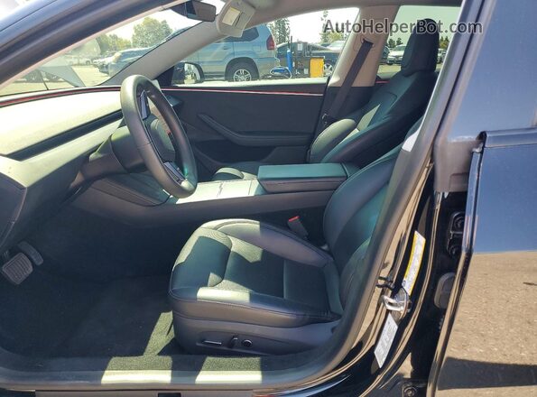 5YJ3E1EB7RF716973 2024 TESLA MODEL Black Front interior view