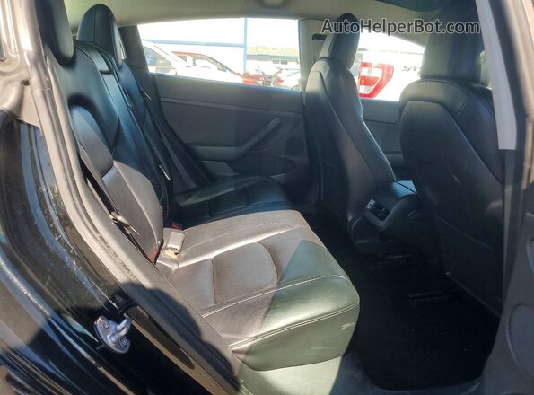 5YJ3E1EB8NF305124 2022 TESLA MODEL Black Widok tylnych siedzeń