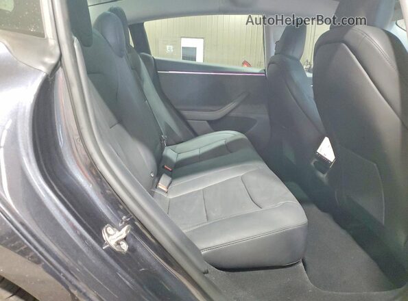 5YJ3E1EB9RF736593 2024 TESLA MODEL Black Rear seats view