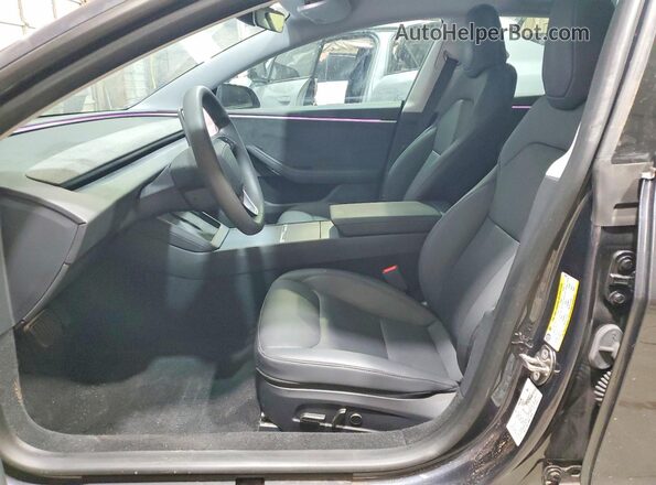 5YJ3E1EB9RF736593 2024 TESLA MODEL Black Front interior view
