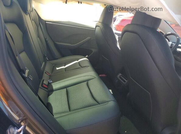 5YJ3E1EB9SF964003 2025 TESLA MODEL Gray Հետևի նստատեղերի տեսք