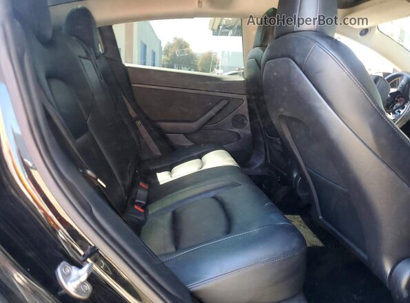 5YJ3E1EC4NF264807 2022 TESLA MODEL Black Widok tylnych siedzeń