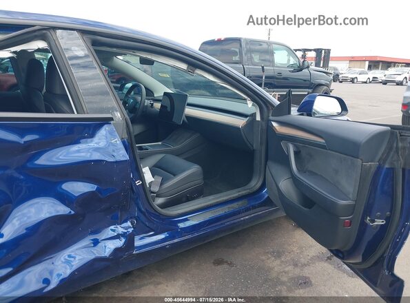 5YJ3E1EC5PF594331 2023 TESLA MODEL 3 Blue Widok wnętrza z przodu