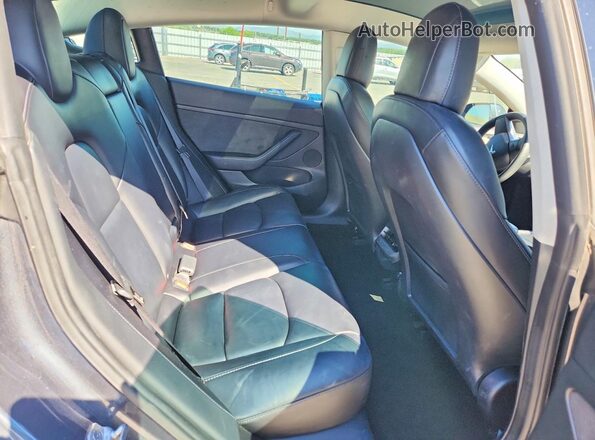 5YJ3E1EC6NF277798 2022 TESLA MODEL Gray უკანა სავარძლების ხედი