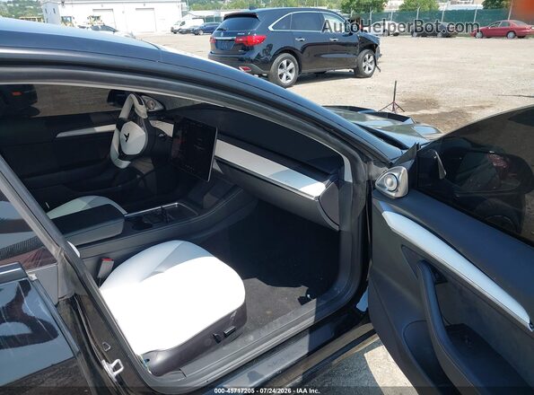 5YJ3E1EC7PF423161 2023 TESLA MODEL 3 Черный Вид салона спереди