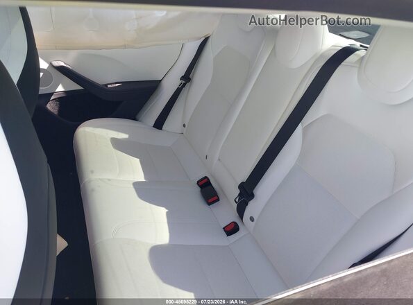 5YJ3E1ET2RF770738 2024 TESLA MODEL 3 Burgundy VIN sticker view