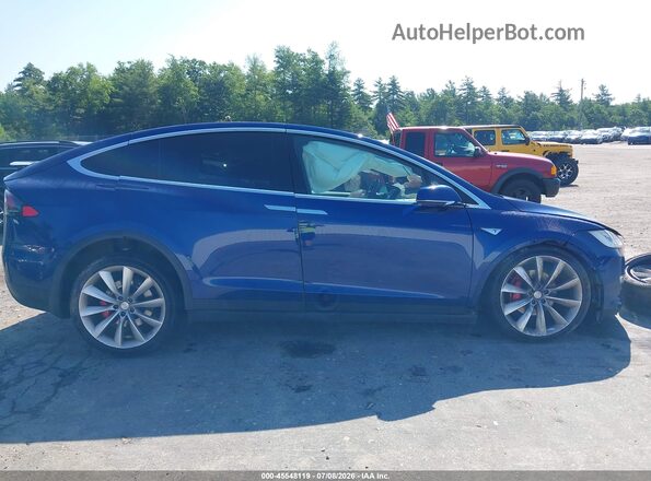 5YJXCAE4XGFS00791 2016 TESLA MODEL X Blue Rear interior view