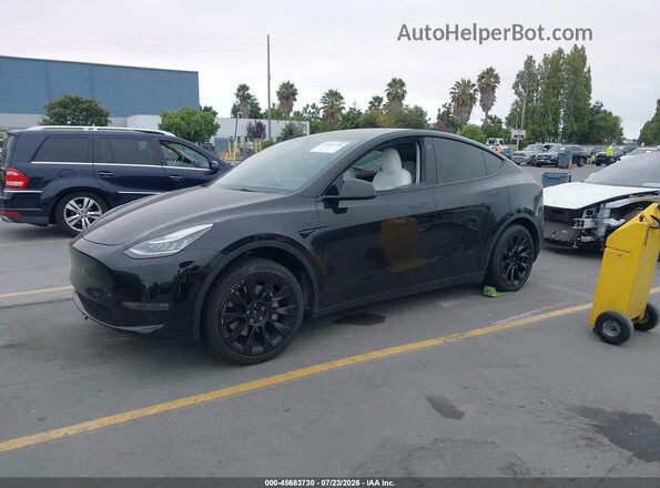 5YJYGDEE0MF102500 2021 TESLA MODEL Y Black Vista tres cuartos delantera izquierda