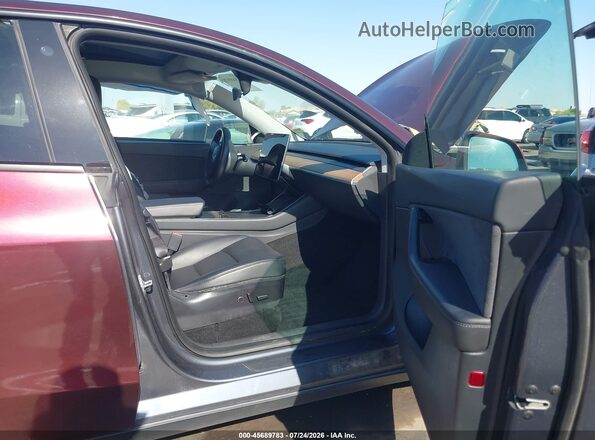 5YJYGDEE4MF087290 2021 TESLA MODEL Y Maroon Front interior view