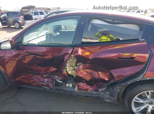 5YJYGDEE4MF087290 2021 TESLA MODEL Y Maroon Rear interior view