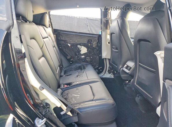 5YJYGDEF7MF249034 2021 TESLA MODEL Black Vista de los asientos traseros