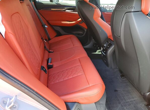 5YM23EC03S9197129 2025 BMW X4 Gray Rear interior view