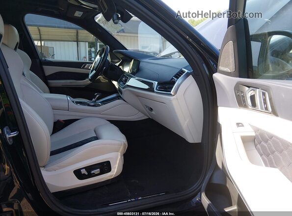 5YMJU0C07N9M23513 2022 BMW X5 Black Front interior view