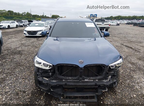5YMTS0C01M9F63055 2021 BMW X3 Blue Widok wnętrza z tyłu
