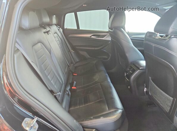 5YMUJ0C00L9B77460 2020 BMW X4 Gray Widok wnętrza z tyłu