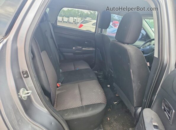 JA4AP3AU5KU015974 2019 MITSUBISHI OUTLANDER Silver Vista del compartimento del motor