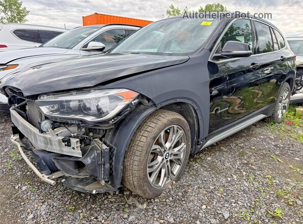 WBXHT3C34J5K22744 2018 BMW X1 Black Rear right