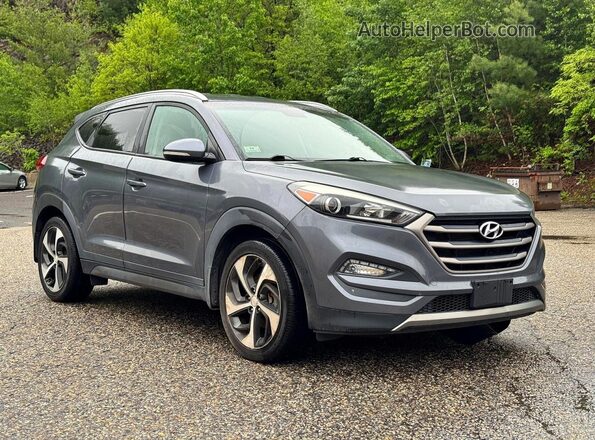 KM8J3CA2XGU194869 2016 HYUNDAI TUCSON Charcoal Rear left