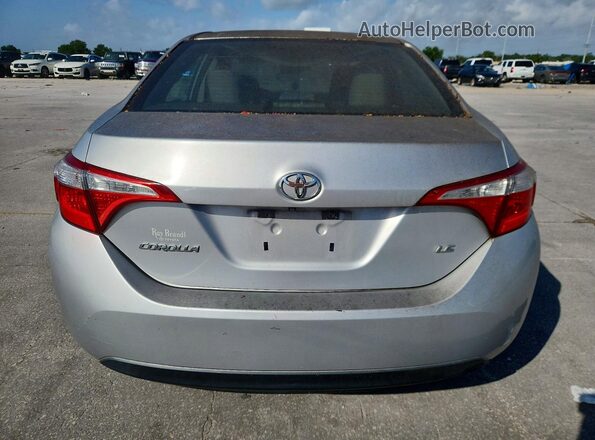 5YFBURHE2GP546039 2016 TOYOTA COROLLA Silver Vista interior delantera