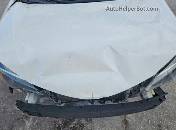 5YFBURHEXKP927002 2019 TOYOTA COROLLA White Vista del compartimento del motor