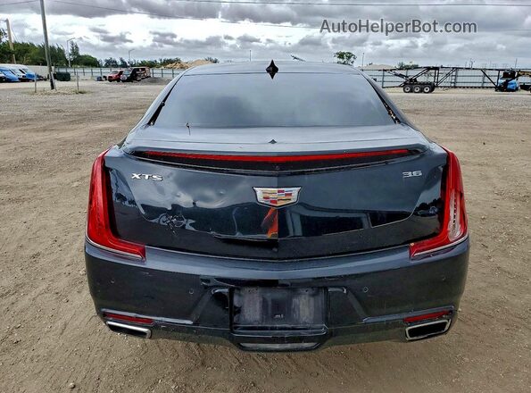 2G61M5S35J9135109 2018 CADILLAC XTS Черный Вид салона спереди