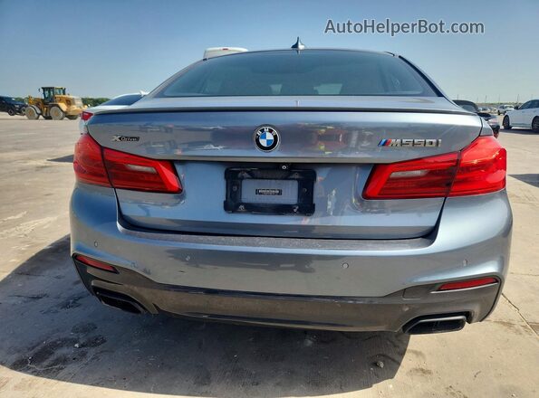 WBAJB9C5XJB035786 2018 BMW M5 Blue Widok wnętrza z przodu
