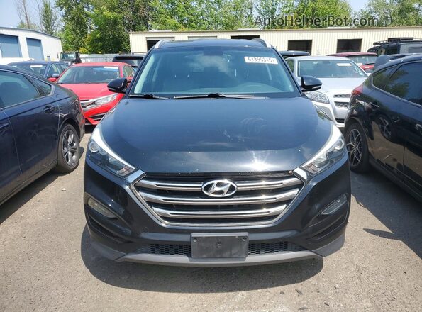 KM8J33A29GU080748 2016 HYUNDAI TUCSON Black Vista trasera