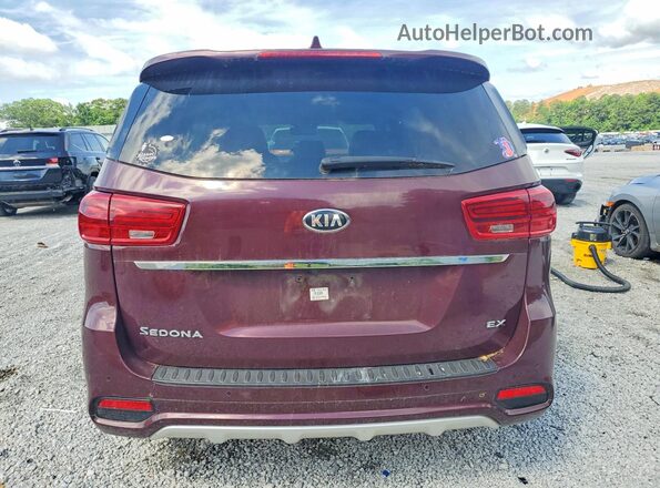 KNDMC5C13K6536886 2019 KIA SEDONA Maroon Rear view