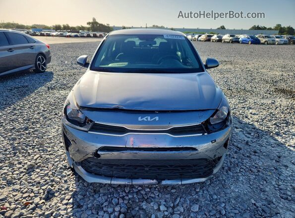 3KPA25AD0PE579330 2023 KIA RIO Gray უკანა ხედი
