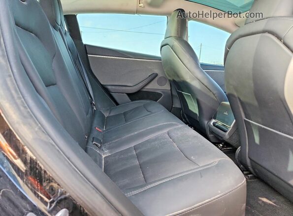 5YJ3E1EA3SF980608 2025 TESLA MODEL Black Rear interior view