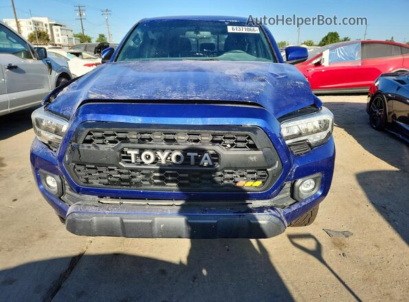 3TMAZ5CN2PM200187 2023 TOYOTA TACOMA Blue Vista trasera