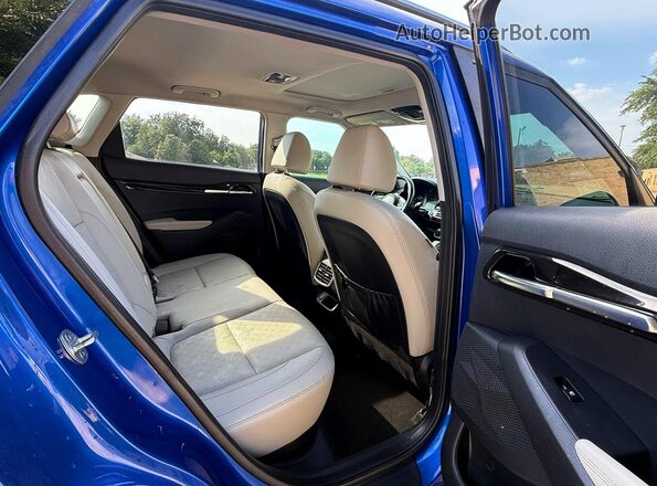 KNDETCA24M7141889 2021 KIA SELTOS Синий Вид салона спереди