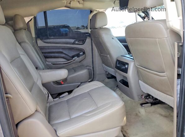 1GNSCHKC3HR374607 2017 CHEVROLET SUBURBAN Tan Widok wnętrza z tyłu