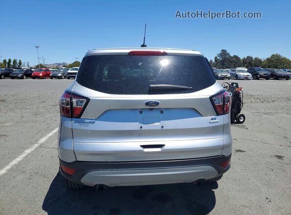 1FMCU0GD4HUE49322 2017 FORD ESCAPE Gray Вид салону спереду