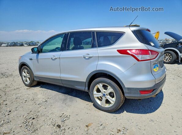 1FMCU9G9XGUB98336 2016 FORD ESCAPE Silver Trasero izquierdo