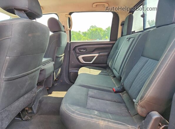 1N6AA1EJ7JN501199 2018 NISSAN TITAN Коричневый Вид задней части салона